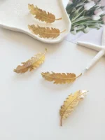 گیره فرانسوی گلد طرح پر (سایز متوسط)